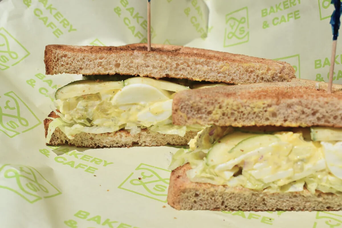 Egg salad sandwich sliced in half